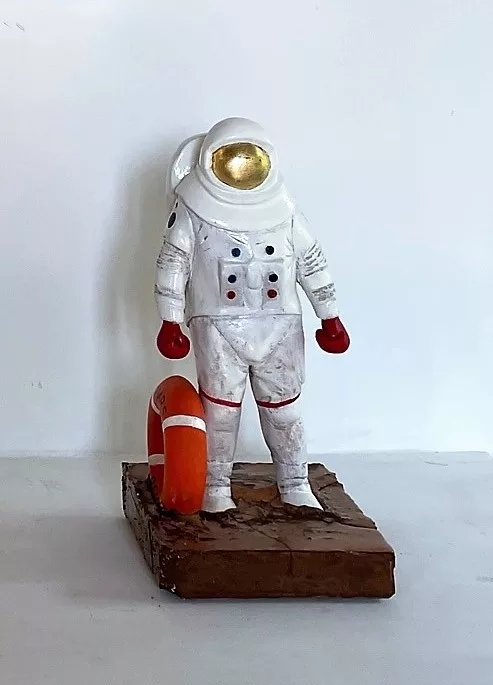 Cosmonaute maitre nageur sauveteur sur Mars beach