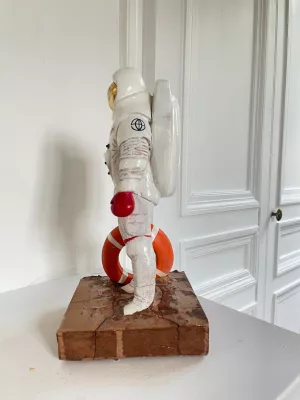 Cosmonaut lifeguard on Mars beach