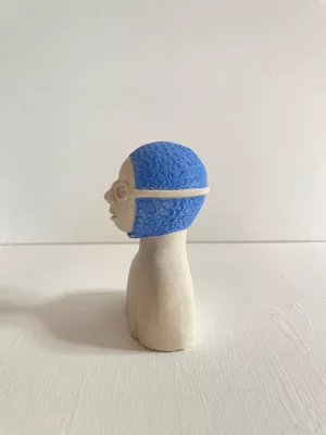 Incognito in a blue hat