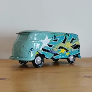 Blue metal WV combi tagged II painted by Kesa Graffiti